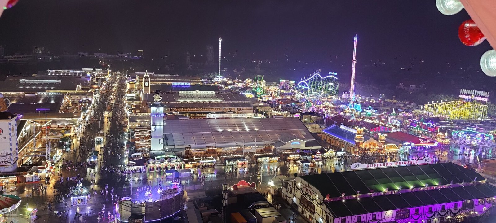Night aerial view of the Oktoberfest fairground and beer tents in Munich